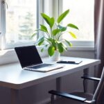 Home office with desk, laptop, and natural light.